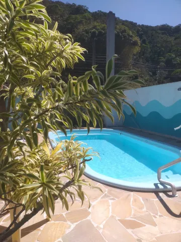 imagem 2 - lindo sobrado mobiliado em Caraguá , com piscina , fogão a lenha churrasqueira, mobiliado imagem 2 - lindo sobrado mobiliado em Caraguá , com piscina , fogão a lenha churrasqueira, mobiliado